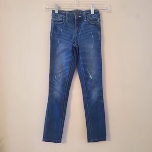 Justice Mid Rise Super Skinny Distressed Jeans